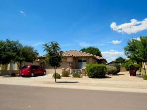 driveway with red car photo